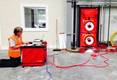 What is a Blower Door Test and why is it required as partof the Legalett HVAC design package?