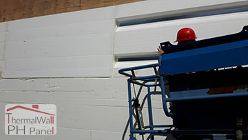 4.Set the ThermalWall PH Passive House Insulated Wall Panel into the foam adhesive